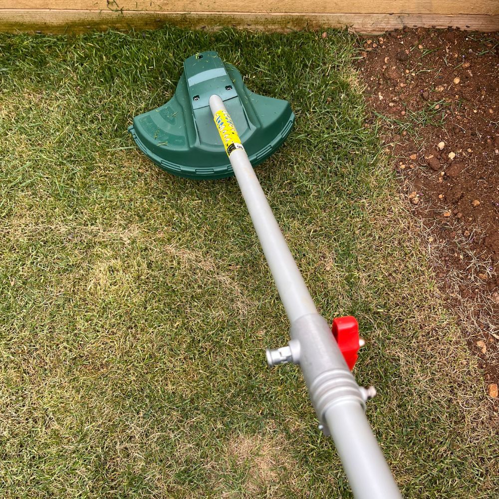 grass strimming with the webb multi tool