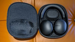 Sonos Ace headphones sitting inside their protective case.