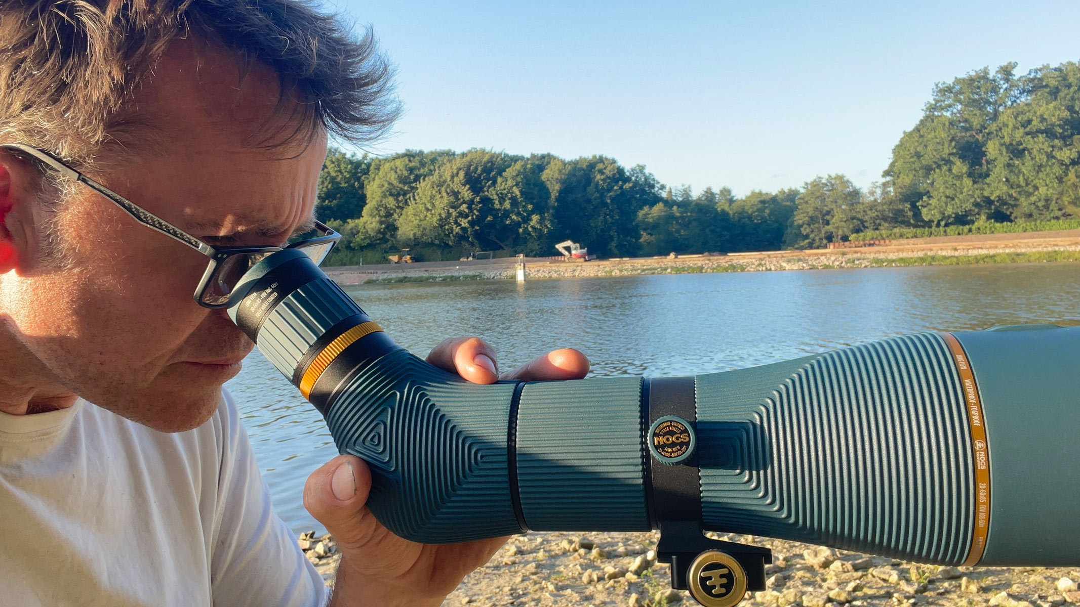 The Nocs Provisions 85mm being used by our reviewed on the edge of a river bank.