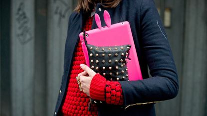 Woman holding accessories