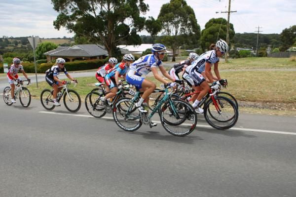 Carlee Taylor (Tibco) and Joanne Hogan (Team Jayco-VIS) and the rest of the break on the main road to the climb