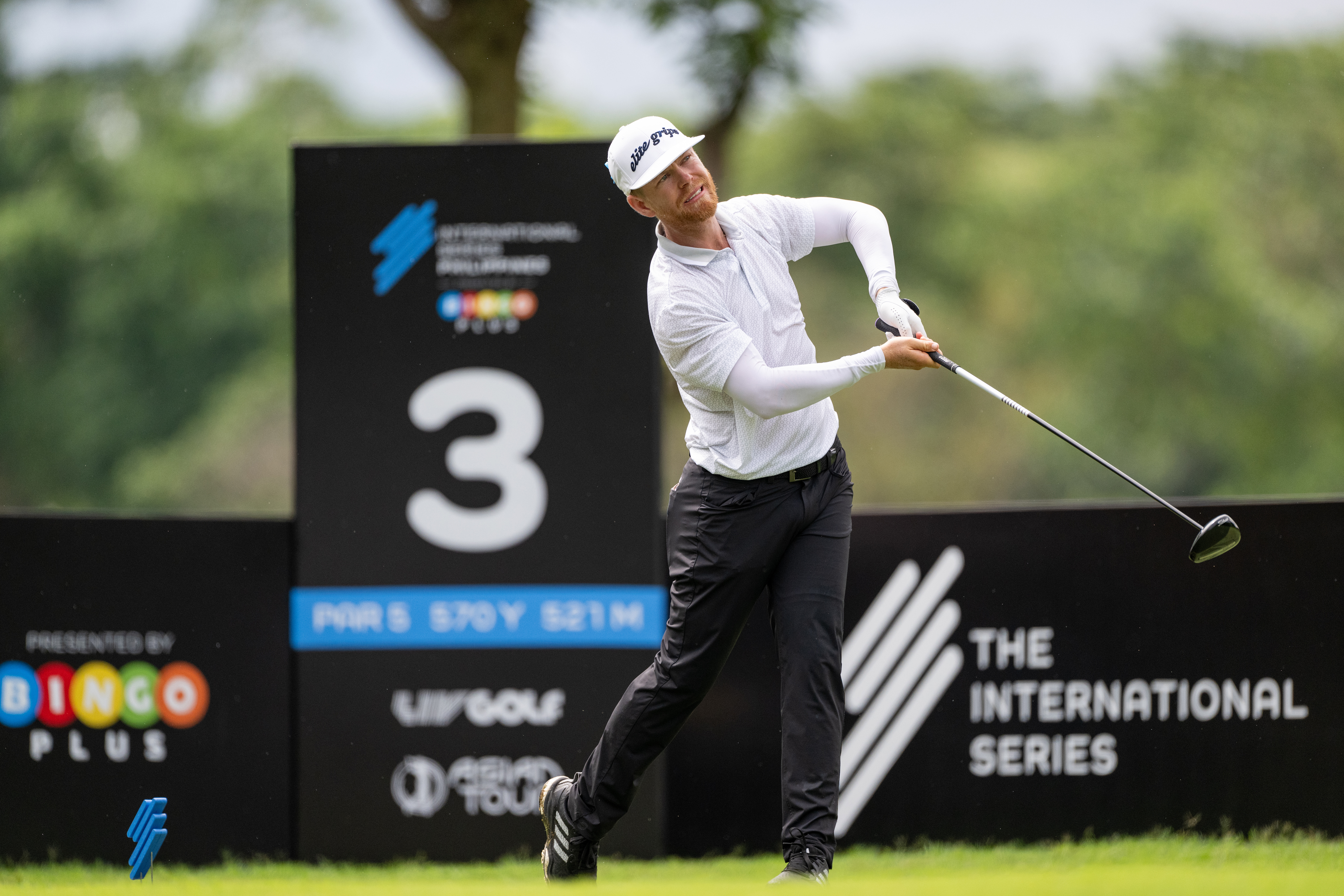 Scott Vincent hits a driver off the tee