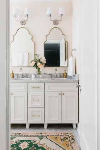 A bathroom with a large vanity