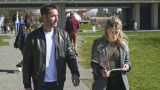 Justin Hartley and Melissa Roxburgh walking together as Colter and Dory in Tracker Season 1x11