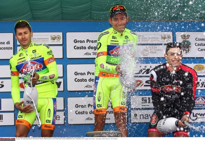 Ponzi, Finetto and Rabottini spray the crowd with champagne