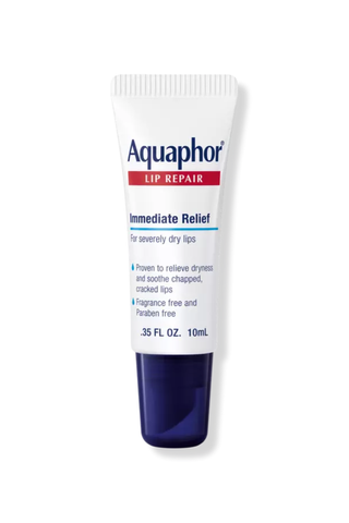 An unopened tube of Aquaphor Lip Repair set against a white background.