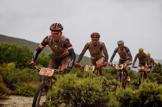 Lukas Fluckiger of BMC Mountainbike Racing leads the chase group