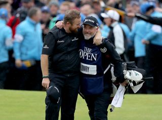 Shane Lowry and caddie Bo Martin celebrate at the 2019 Open