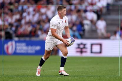 Owen Farrell carrying a rugby ball during a match