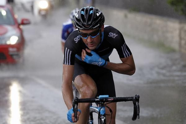 Michael Barry (Team Sky), a member of the stage nine breakaway, checks in with his team via radio.