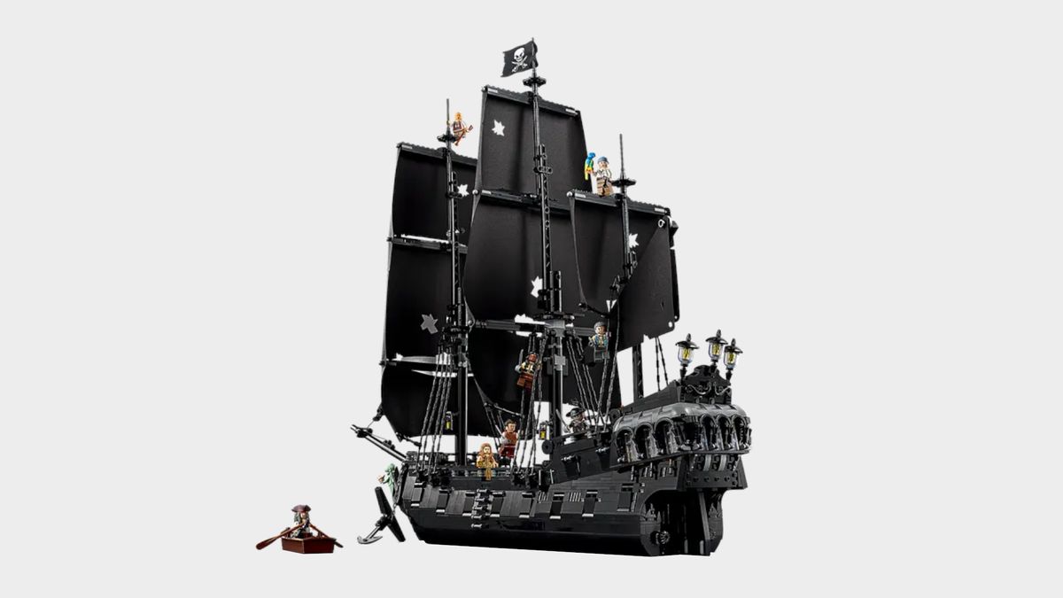Lego Captain Jack Sparrow's Pirate Ship set and minifigures against a plain background