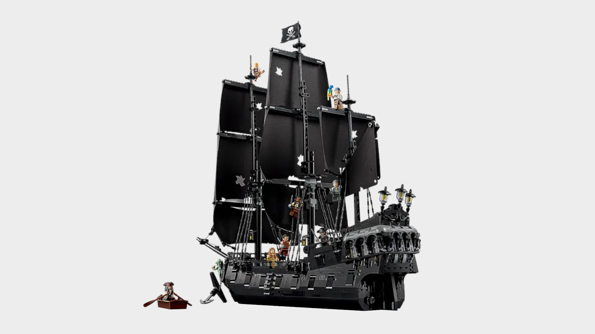Lego Captain Jack Sparrow's Pirate Ship set and minifigures against a plain background