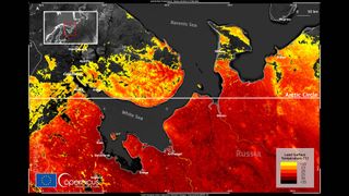 Land surface temperatures of more than 85 degrees Fahrenheit (30 degrees Celsius) have been recorded close to the Arctic Circle last week as shown in this image captured by the European Earth-monitoring satellite Sentinel-3.