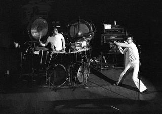 Pete Townshend smashing a guitar onstage