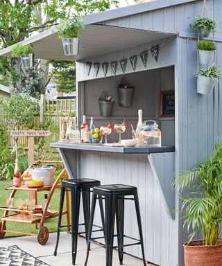 Garden bar ideas on a budget Garden shed with shelf and open hatch