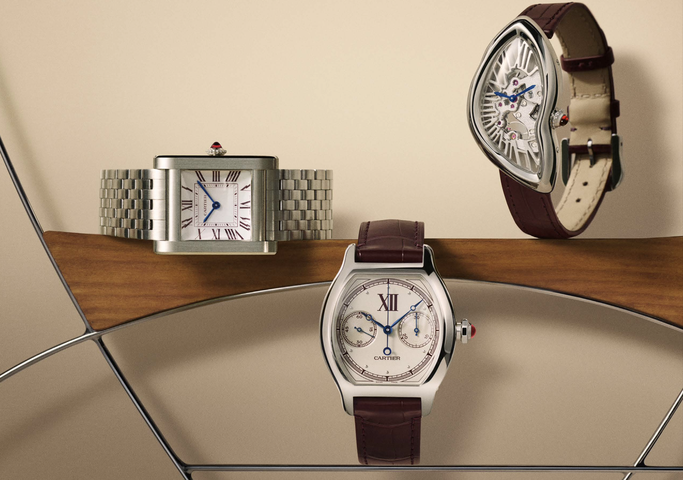 three cartier watches
