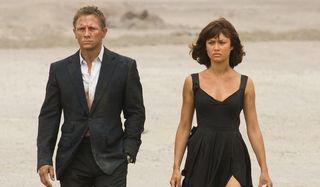 Quantum of Solace Bond and Camille walking through the desert