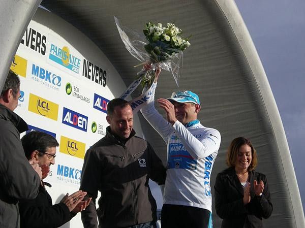Andriy Grivko was given the white jersey of best young rider by former world champion Luc Leblanc.