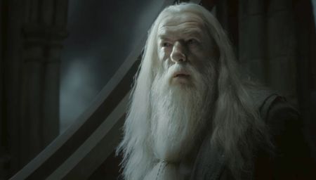 Dumbledore standing in the astronomy tower in Harry Potter and the Half-Blood Prince