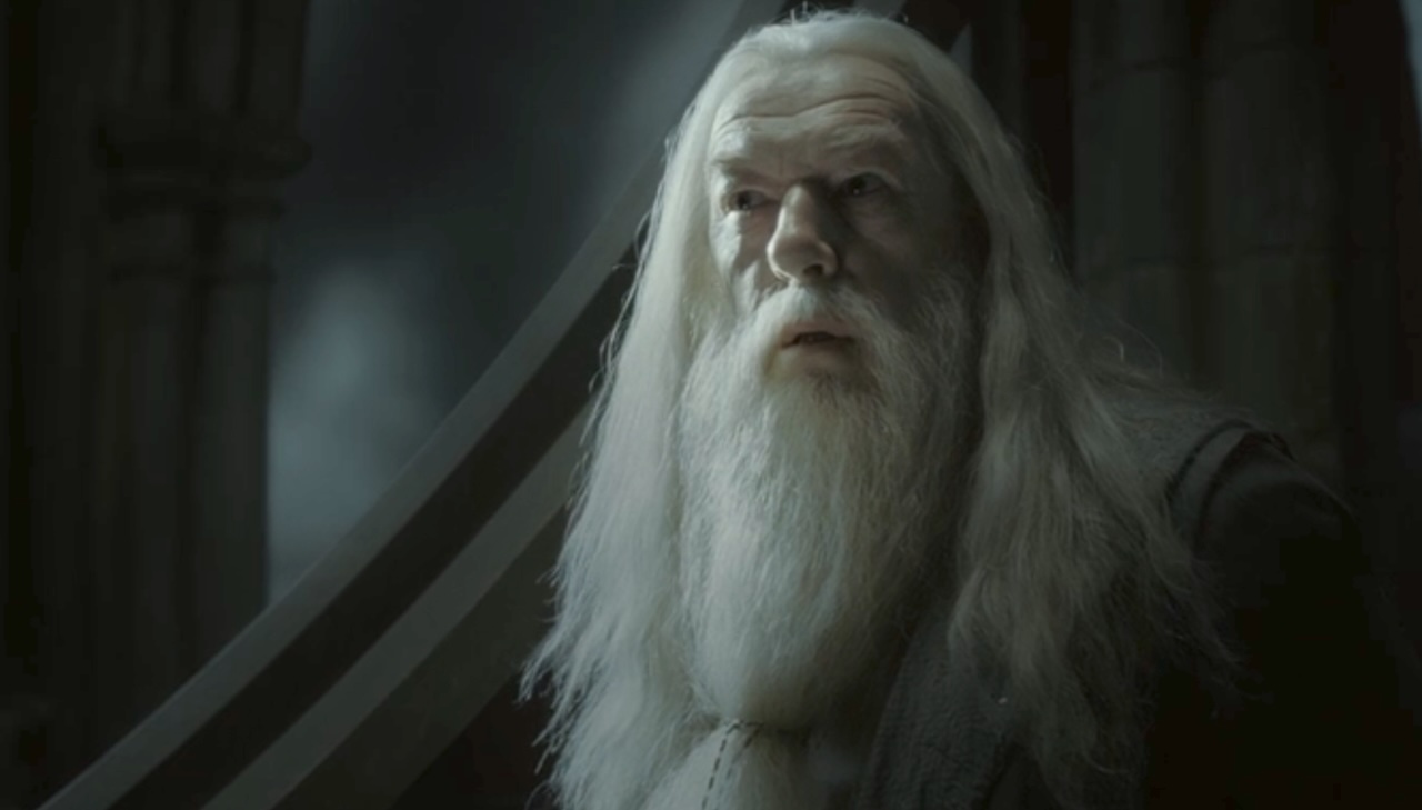 Dumbledore standing in the astronomy tower in Harry Potter and the Half-Blood Prince