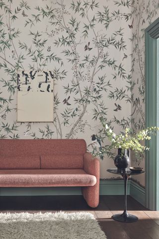 green skirting board with floral wallpaper in hallway