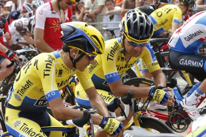 Teammates Jesus Hernandez and Sergio Paulhino talk at the start