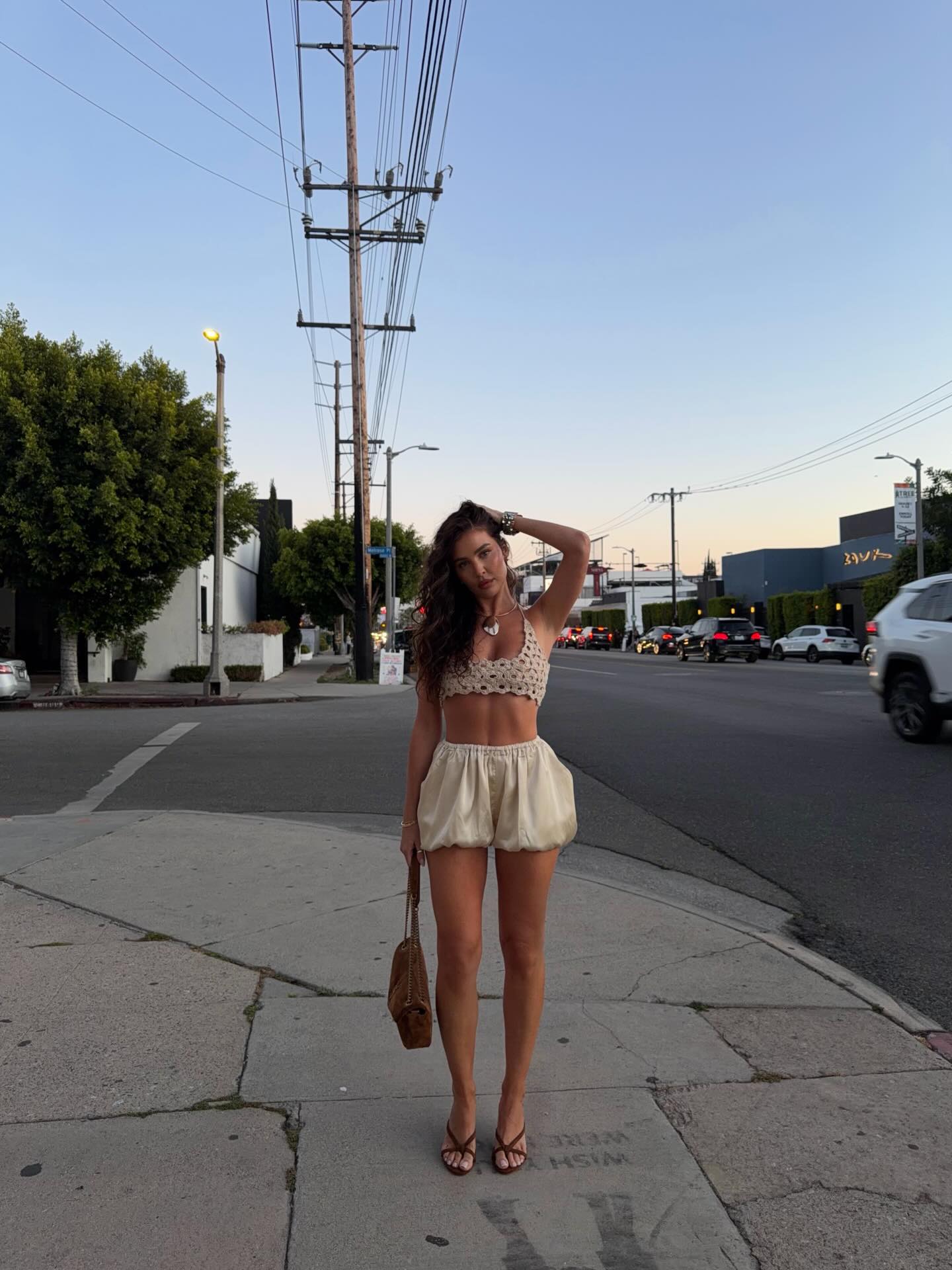An image of a woman wearing best off white skirt for summer