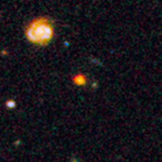 Close-up view from the Hubble Space Telescope of the newly discovered galaxy core GOODS-N-774, also known as "Sparky," which lies 11 billion light-years from Earth.