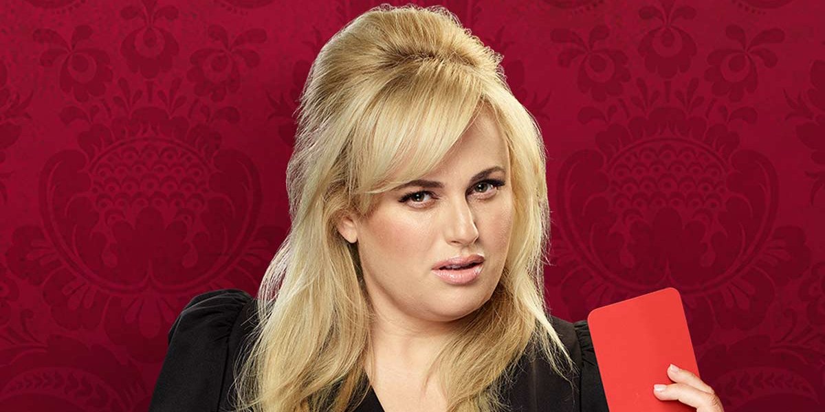 Last One Laughing Rebel Wilson holding a red card