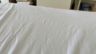 Tempur Cooling Tencel Mattress Protector spread over the bed