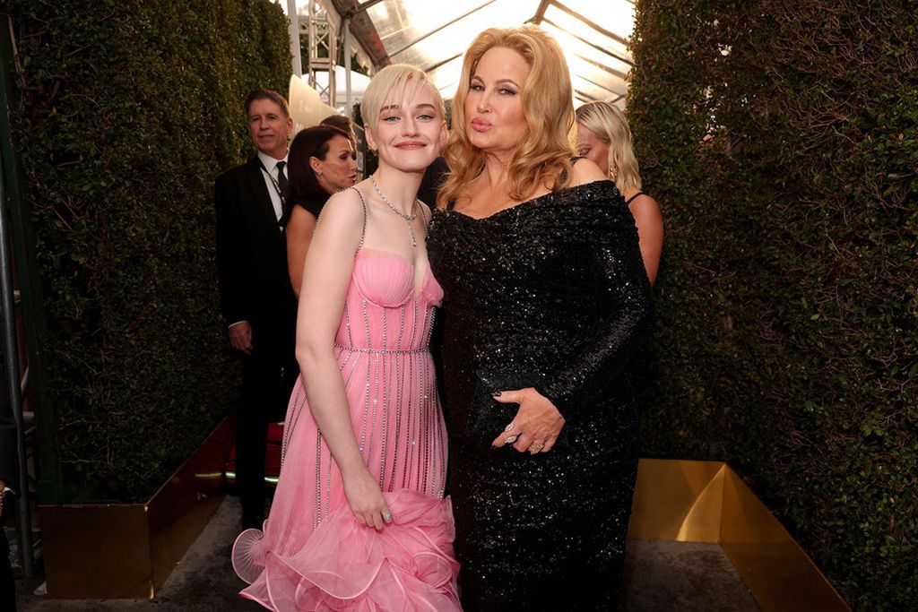 Julia Garner (l.), who won a Golden Globe for Best Supporting Actress in a TV Series for Ozark, and Jennifer Coolidge, winner for Best Supporting Actress in a Limited Series, Anthology or Movie made for TV for The White Lotus, arrive at the ceremony.