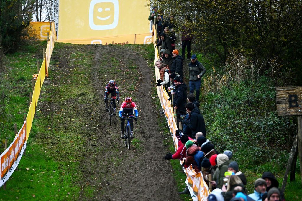 BOOM BELGIUM DECEMBER 03 LR Eli Iserbyt of Belgium and Team Pauwels Sauzen Bingoal and Lars Van Der Haar of The Netherlands and Team Baloise Trek Lions compete during the 7th Superprestige Cyclocross Boom 2022 Mens Elite Superprestige2023 on December 03 2022 in Boom Belgium Photo by Luc ClaessenGetty Images