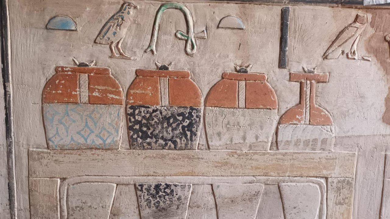 A wall painting of large containers