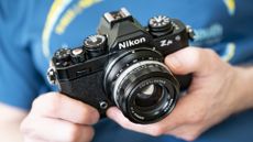 Voigtlander D 35mm f1.2 Nokton lens in the hand