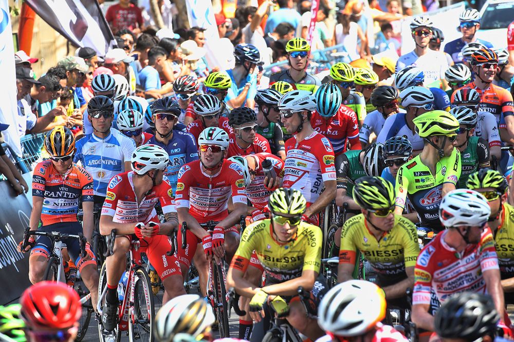 The riders line up in the shade