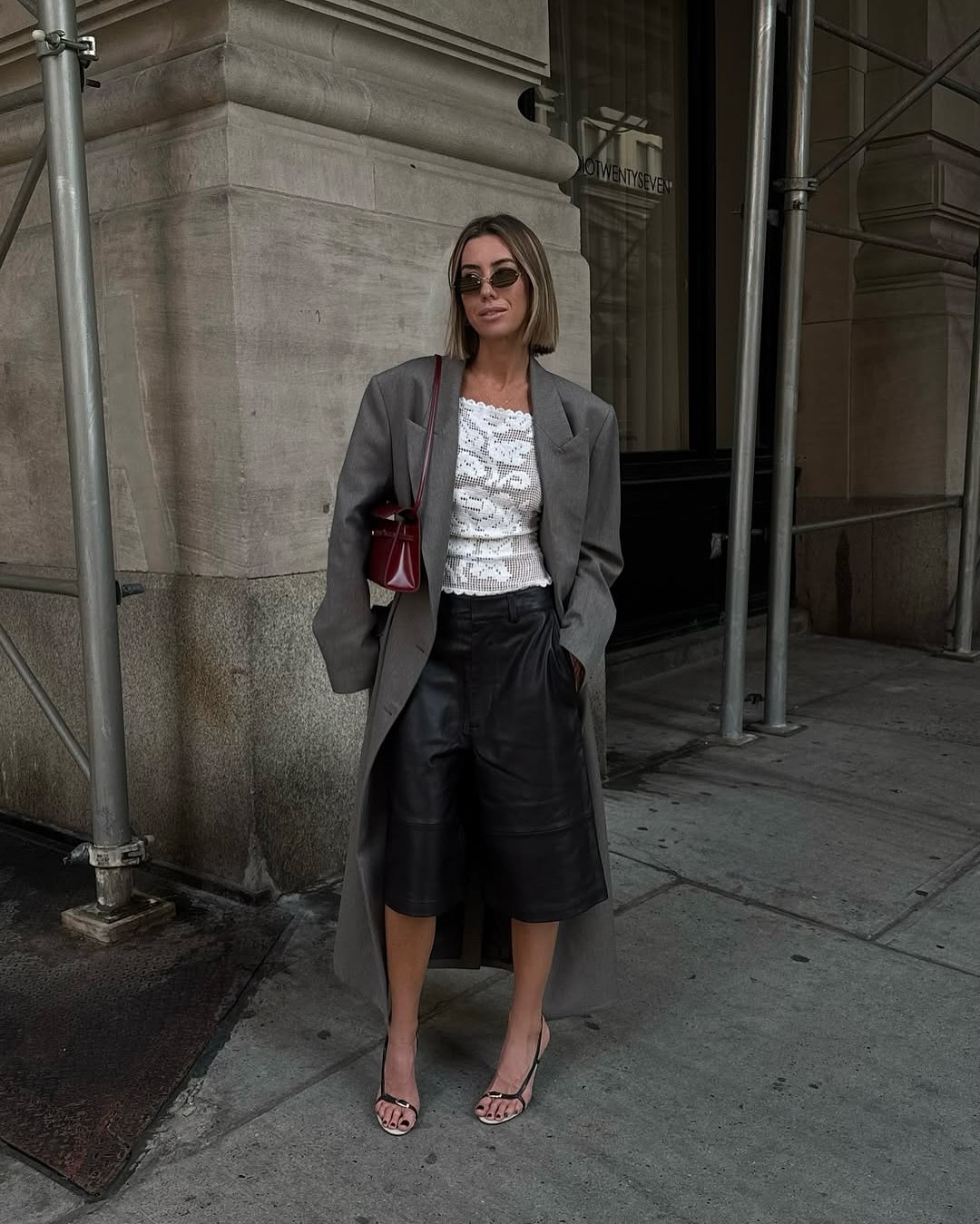 Hannah ins leather shorts and strappy heels