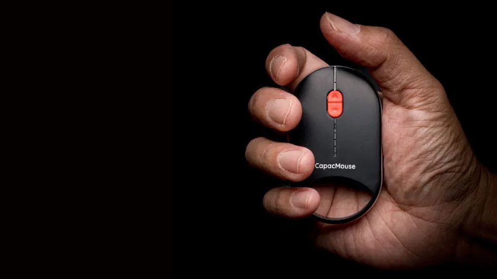 Incredibly tiny pressure-sensitive mouse can be latched onto a keychain like a sleek car remote