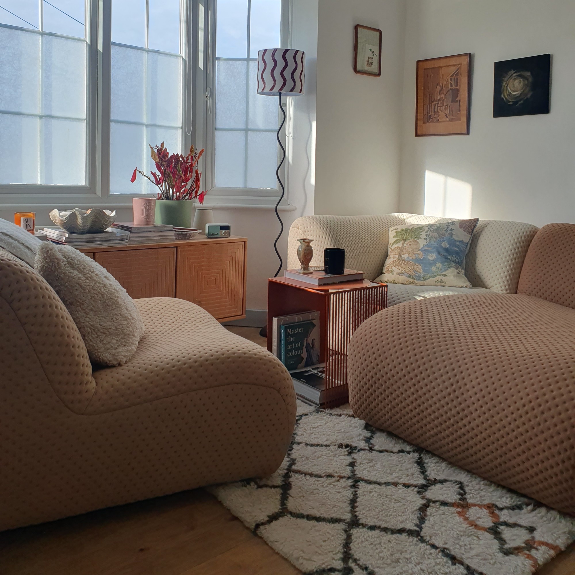 A living area with a multicoloured King Living 1977 modular sofa