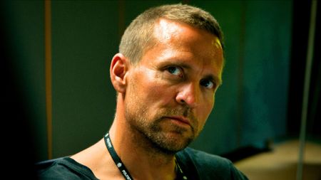 Harry Hole looks at someone offscreen