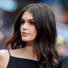 Kaia Gerber hosted a Library Science event in a halter LBD and brown ballet flats