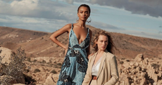 2 models wearing items of clothing available from Intermix.