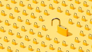 High angle view of many yellow padlocks on yellow background with one of them open.