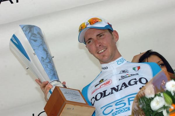 Manuel Belletti (Colnago - CSF Inox) shows off his winner's trophy.