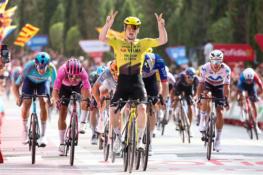 Team Visma-Lease a bike's British rider Matthew Brennan celebrates as he crosses the finish line to win the fifth stage of the Vuelta a Espana 2026, a 173,4 km race between Falset and Roquetes on August 26, 2026. (Photo by Josep LAGO / AFP)