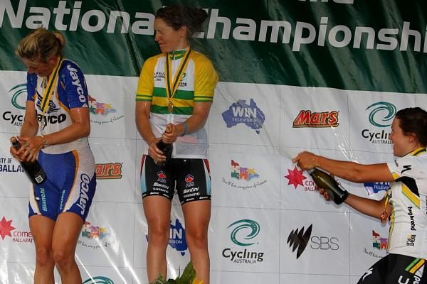 Chloe Hosking (HTC-HighRoad) gets in the 'first shot' on the podium with Joanne Hogan (Jayco-VIS) and Lauren Kitchen (Jayco-AIS).