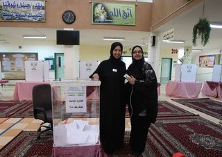 Two Saudi Arabian women at voting station