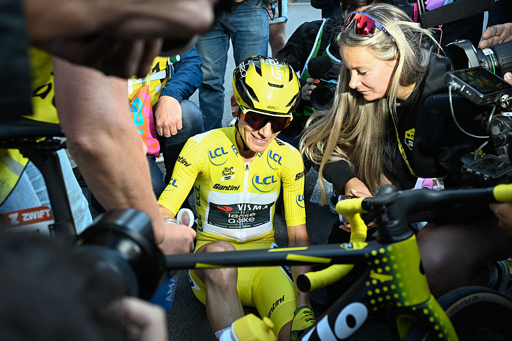 Pauline Ferrand-Prévot surrounded by the media after winning stage 9 and the overall title at the Tour de France Femmes