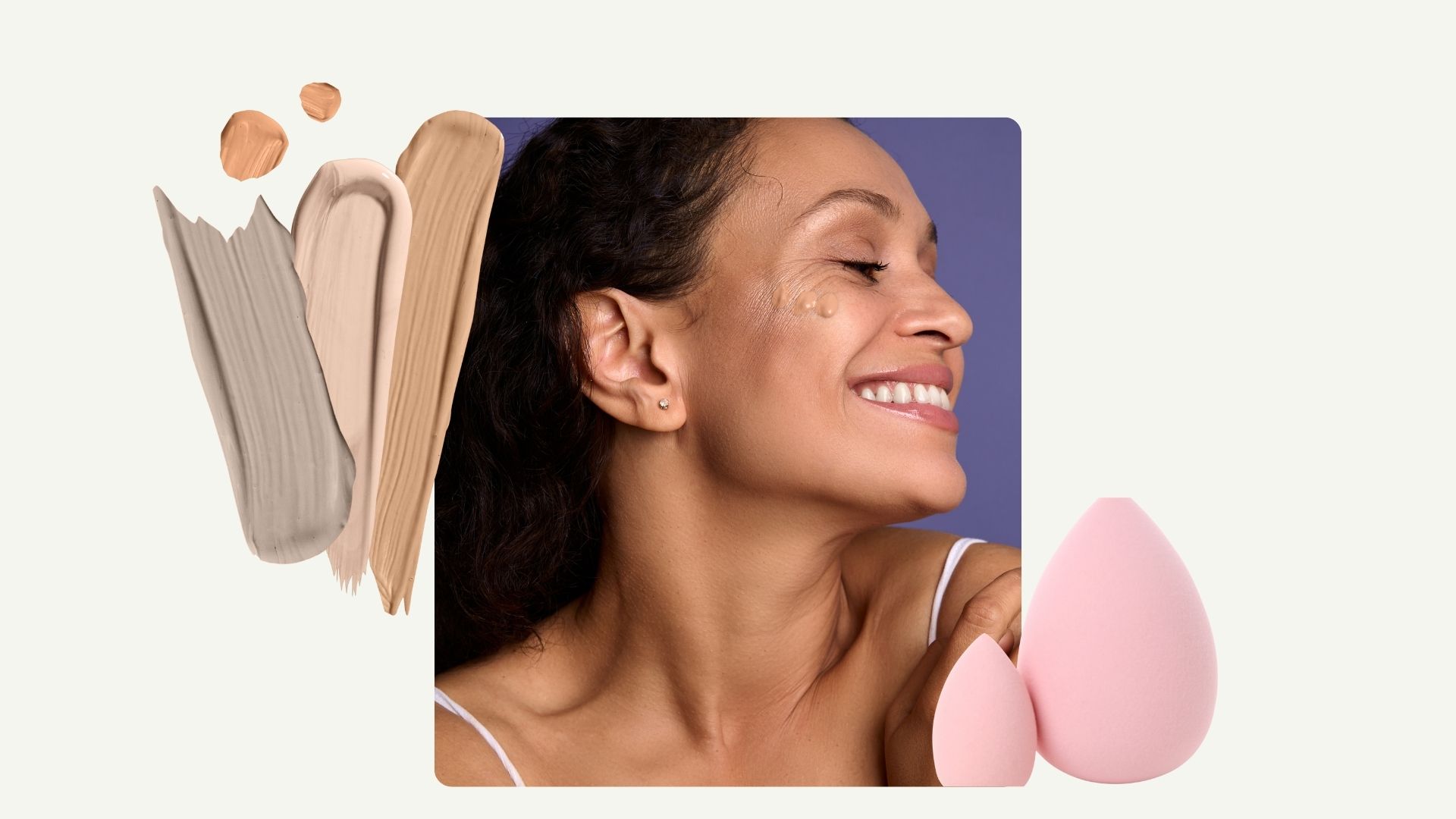 a woman&#039;s smiling face with brown hair and glowing skin, with dots of foundation on her cheek, beside three smudges of foundation in different colours with a pink beauty blender sponge