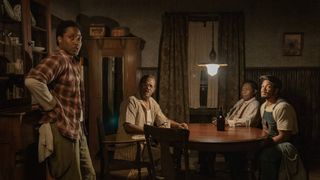 (L-R) John David Washington as Boy Willie Charles, Samuel L. Jackson as Doaker Charles, Michael Potts as Wining Boy Charles and Ray Fisher as Lymon in "The Piano Lesson" on Netflix