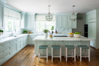 A kitchen in an aqua blue